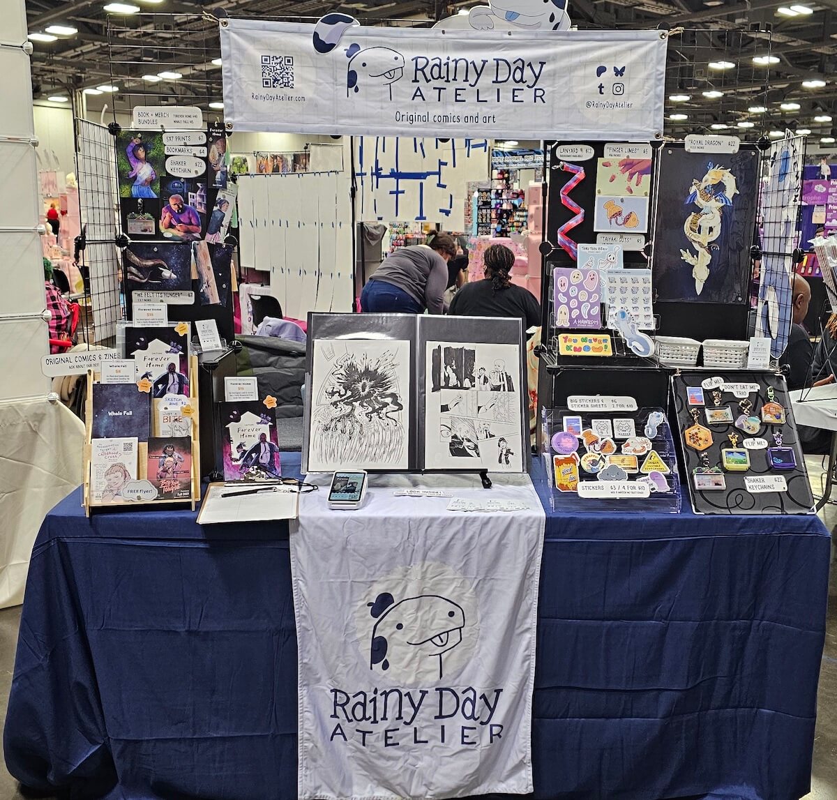 Photo of our table setup at Matsuricon 2025