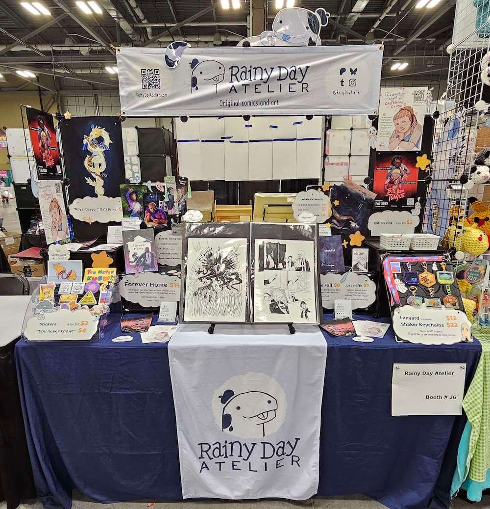 Photo of our table setup at Fayetteville Anime Fest 2025